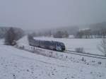 Ein VT der Vogtlandbahn ist am 30.12.11 in Rebersreuth Richtung Adorf unterwegs.