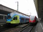 RB 66 nach Osnabrck neben einer 643 der DB am 13.04.2008 in Mnster Hbf