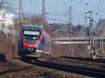 Ein Talent der Euregiobahn (RB20) legt sich am 29.01.2011 auf der KBS 480 bei Aachen Rothe Erde in die Kurve.