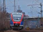 Ein Talent der Euregiobahn legt sich am 15.02.2011 auf der Fahrt nach Alsdorf-Annapark auf der KBS 480 bei Aachen Rothe Erde in die Kurve.