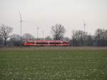 Bei einem Mix aus Wolken und Sonne passiert der VT 643 die Bauernschaften zwischen Ahaus und Epe und fhrt dann weiter nach Enschede.