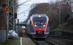 Zwei Euregiobahn (RB20) aus Eschweiler-Sankt-Jöris nach  Langerwehe-Stolberg-Altstadt und kommen die Kohlscheider-Rampe hoch aus Richtung Herzogenrath und halten in Kohlscheid und fahren in