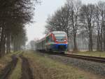 Ein PEG Talent ist als RB51  Westmnsterland-Bahn  nach Dortmund Hbf zwischen Gronau-Epe und Ahaus unterwegs.