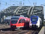 Talent 1 und sein Nachfolger Talent 2. 644 016 und NX 875 überqueren gemeinsam die Hohenzollernbrücke in Richtung Deutz.

Köln 23.03.2022