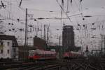 Paralelleinfahrt mit 644 054-9 und 111 009-7 mit dem RE 9 nach Gieen in Kln Hbf am 22.12.2008