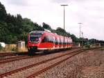 644 002-1/944/644 mit RE 11420 (Eifel-Express) Gerolstein-Kln Deutz in Jnkerath am 23-7-2004.