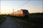 RE57 (RE 29525)  Dortmund-Sauerland-Express , von Dortmund Hbf nach Bestwig, durchfhrt das Ruhrtal bei Wickede (Ruhr) Richtung Bestwig.