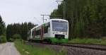 Die Elster Saale Bahn.........ist der  Produktname  für die Relation Gera - Hof. 
Die Erfurter Bahn hat nach Einstellung des RE Gera - Regensburg diese Leistung von der DB übernommen. Nun müssen die Fahrgäste in Hof umsteigen. Die Strecke erfreut sich großer Beliebtheit (besonders auch Sonntags) und die Züge, die im 2 Stundentakt verkehren sind gut ausgelastet. Vielleicht ist auch das immer freundliche Personal ausschlaggebend für die gute Annahme der Verbindung. VT 308 + 316 sind im Wäldchen zwischen Reuth und Kornbach unterwegs. Hier wird mehrmals die Grenze Sachsen - Thüringen überquert. in Mehltheuer zweigen die beiden RegioShuttle von der Magistralen Hof - Leipzig auf die  Mehlbahn  ab. Dann geht es über Zeulenroda und Weida zum Endziel Gera. Vielen Dank an den Tf. für den freundlichen Gruß. 
Bahnstrecke 6362 Leipzig (Bayerischer Bahnhof) - Hof am 23 Mai 2014