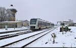 1648 915-4 und 1648 902-2 (Alstom Coradia LINT 41) bei der Ausfahrt vom Bahnhof Aschersleben auf Höhe des Wasserturms.