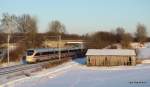 Bei tiefstehender, winterlicher Nachmittagssonne des 27.01.10 fhrt ICE 36 von Kopenhagen nach Hamburg Hbf durch das beschauliche Drfchen Altenfelde kurz vor Reinfeld (Holst.).