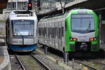 Die Triebzüge VT 110 & 3429 008 im Februar 2021 beim Halt am Hauptbahnhof Wuppertal.