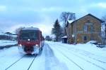 Vom Winter gezeichnet steht 610 004 als RE 3508 Neustadt (WN)-Nrnberg am 30.01.2010 im Bahnhof Freihung an der Strecke Weiden-Neukirchen.