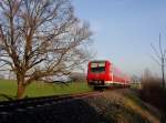 611 034 als RB 22621 von Ulm nach Leutkirch am 23.03.2011 zwischen Wolfegg und Kilegg.