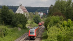 Am 01.06.2016 begegnen sich 232 618-9 mit dem Kieszug Roßberg - Friedrichshafen und 611 006 mit dem IRE-Sprinter in Richtung Ulm Hbf bei Aulendorf-Zollenreute/Rugetsweiler.