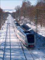 IC 1568 mit zwei 612er Einheiten fuhr in Klingenberg-Colmnitz auf dem berholgleis, um am warteten RE 17314 vorbeizufahren und hat auf dem Weg von Desden nach Nrnberg nach nur 25 km bereits 10 Minuten Versptung - 23.01.2004
