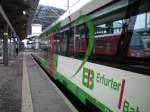 Eine BR 612er Einheit spiegelt sich im Itino der EIB.Januar 09.Erfurt Hbf