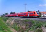 Triebwagen der BR 612 als RE 3705 aus Leipzig auf seiner Fahrt nach Hof, hier in Hhe KfZ-Werk  Ernst Grube  in Werdau, 02.05.2009.