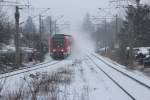 612 521 und 612 *** bei starken Schneefall mit dem IRE nach Nrnberg Hbf bei der Durchfahrt in Zwickau Plbitz.