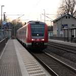 612 971 und 612 656 fahren am 21.12.2013 mit dem IRE 3445 nach Dresden Hbf, hier bei der Durchfahrt in Mosel.