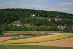 Am 13.05.07 sind zwei 628 mit einem Regionalexpress von Heidelberg nach Heilbronn vor der Kulisse des Hoffenheimer Fuballstadions unterwegs.