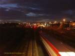 Am Ende der blauen Stunde ca 17.30 heisst es Ausfahrt fr den 628er nach Bad Steben im Hofer Hbf. Vom Luftsteg aus entstand diese Bewegungsstudie auf das Ausfahrtsignal zu mit der  Skyline  von Hof am Abend des 3.11.2009. Ab 2011 fhrt u.a diese Leistung Agilis...