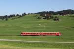 628 239 als RB 57341 am 27.08.2012 bei Weizern-Hopferau.