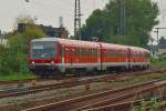 Eine RB 38 gefhrt vom 928 535 verlsst gerade Grevenbroich in Richtung Dsseldorf Hbf. 30.8.2013