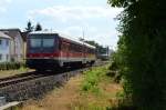 Aus Bensheim kommt der ehemalige Rheinländer 628/928 599 in Lorsch an der Nibelungenbahn eingefahren am 21.7.2015