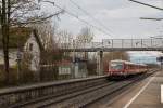 628 584-5 wurde mit seinem Schwesterfahrzeug auf seiner Fahrt von München Hbf nach Mühldorf bei der Durchfahrt am Haltepunkt Grub im Bild festgehalten.