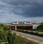 Veolia BR 640 LINT 27 als Harz-Elbe-Express HEX 80861 Halberstadt - Magdeburg, KBS 315 Thale - Magdeburg, fotografiert beim berqueren der Autobahn A 14 bei Dodendorf am 23.06.2012