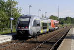 Ausfahrt Bad Lausick: VT 641 001 (rot, vorn) und 641 034. (RB 113 Leipzig - Geithain,,  Der Geithainer , Bad Lausick, 14.5.18). Bei Kreuzungen mit dem RE 6 hält dieser in beiden Richtungen am Hausbahnsteig, die RB benutzt, ebenfalls in beiden Richtungen, wie im Foto Gleis 2.