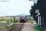 642 119 ist am 25.7.02 auf dem Weg nach Rothenburg ob der Tauber und erreicht den Haltepunkt Schweinsdorf.