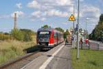 642 553 wartet im August 2014 in Tessin auf die Abfahrt als RE nach Wismar.