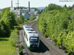 VT 26 nach Regensburg am 25.5.11 vor der Kulisse von Rslau. Der neue Haltepunkt liegt im Rcken des Fotografen und damit immer noch weit von der Bebauung entfernt. 