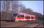 Talent 643102 auf Überführungsfahrt. Der Triebwagen fährt hier gerade am 5.3.2004 um 9.20 Uhr durch den Bahnhof Natrup-Hagen in Richtung Münster.