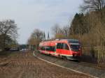 Die RB63  Baumberge-Bahn von Coesfeld nach Mnster Hbf hat in Form von 643 056 (entklebt) den Bahnhof Billerbeck verlassen, im Hintergrund der Ludgerus Dom zu Billerbeck.