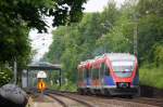 Ein Nachschuss von Zwei Euregiobahn (RB20) aus aus Langerwehe-Stolberg-Altstadt nach Heerlen(NL) und hilt in Kohlscheid und fährt die Kohlscheider-Rampe herunter nach Herzogenrath. Bei Sonne und Wolken am Morgen vom 23.5.2014.