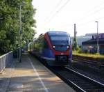 Zwei Euregiobahn (RB20) aus Heerlen(NL)-Stolberg-Altstadt-Düren kommt die Kohlscheider-Rampe hoch aus Richtung Herzogenrath und hält in Kohlscheid und fährt in Richtung Richterich,Laurensberg,Aachen-West. 
Bei schönem Sonnenschein am Morgen vom 24.6.2014.