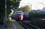 Zwei Euregiobahn (RB20) begegnen sich im Bahnhof Kohlscheid bei schönem Sonnenschein am Morgen vom 17.9.2014.