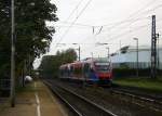 Ein Nachschuss von der Euregiobahn (RB20) aus Langerwehe-Stolberg-Altstadt nach Heerlen(NL) aus Richtung Aachen-West,Laurensberg,Richterich und hilt in Kohlscheid und fährt in Richtung Herzogenrath. 
Bei Sonne und Wolken am Morgen vom 23.10.2014.