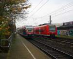 Die Euregiobahn (RB20) kommt aus Heerlen(NL)-Stolberg-Altstadt-Düren und kommt die Kohlscheider-Rampe hoch aus Richtung Herzogenrath und hält in Kohlscheid und fährt in Richtung Richterich,Laurensberg,Aachen-West.
Bei Nebelwolken am Morgen vom 18.11.2014.