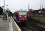 Die  Euregiobahn (RB20) steht in Langerwehe-Heerlen(NL) bei Regenwetter am Kalten 13.12.2014.