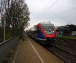 Die Euregiobahn (RB20) kommt aus Heerlen(NL)-Stolberg-Altstadt-Düren und kommt die Kohlscheider-Rampe hoch aus Richtung Herzogenrath und hält in Kohlscheid und fährt in Richtung