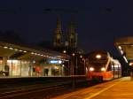 644 030 stand am 5.12 als RB38 von Neuss kommend in Köln Deutz und wird gleich ins Deutzer Feld einfahren und dort auf die Rückfahrt warten. Im Hintergrund ist das Wahrzeichen der Stadt Köln zu sehen, der Kölner Dom.

Köln 05.12.2015