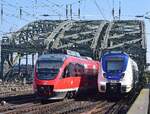 Talent 1 und sein Nachfolger Talent 2. 644 016 und NX 875 überqueren gemeinsam die Hohenzollernbrücke in Richtung Deutz.

Köln 23.03.2022
