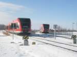 Hier 646 008-3 als RE6, der von Neuruppin West nach Berlin-Spandau mitgeführt wird und im Hintergrund 646 022-4 als RE6 von Wittenberge nach Berlin-Spandau, diese beiden Züge trafen sich am 21.2.2010