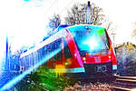 648 353 am 16.01.2021 auf der Strecke Lübeck-Kiel in Höhe Bad Schwartau.Reflexe verleihen dem farbintensiven Bild etwas  nicht-Alltägliches .
