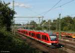 Eine Dreifachtraktion Baureihe 648 verlässt am Nachmittag des 15.07.2015 Lübeck.