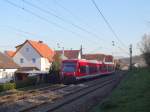 Am 12.3.14 beschleunigte 650 015 mit einem weiteren Shuttle aus dem Bahnhof Wannweil heraus. 
Aufgenommen bei der Ausfahrt aus genau diesem Bahnhof. 