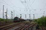 254 052 am 02.05.2010 mit Gterzug bei der Ausfahrt aus Merseburg Gbf